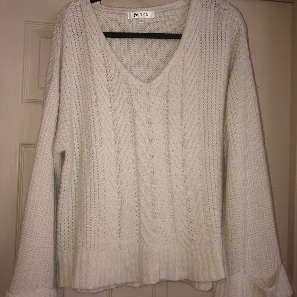 Cream boutique sweater